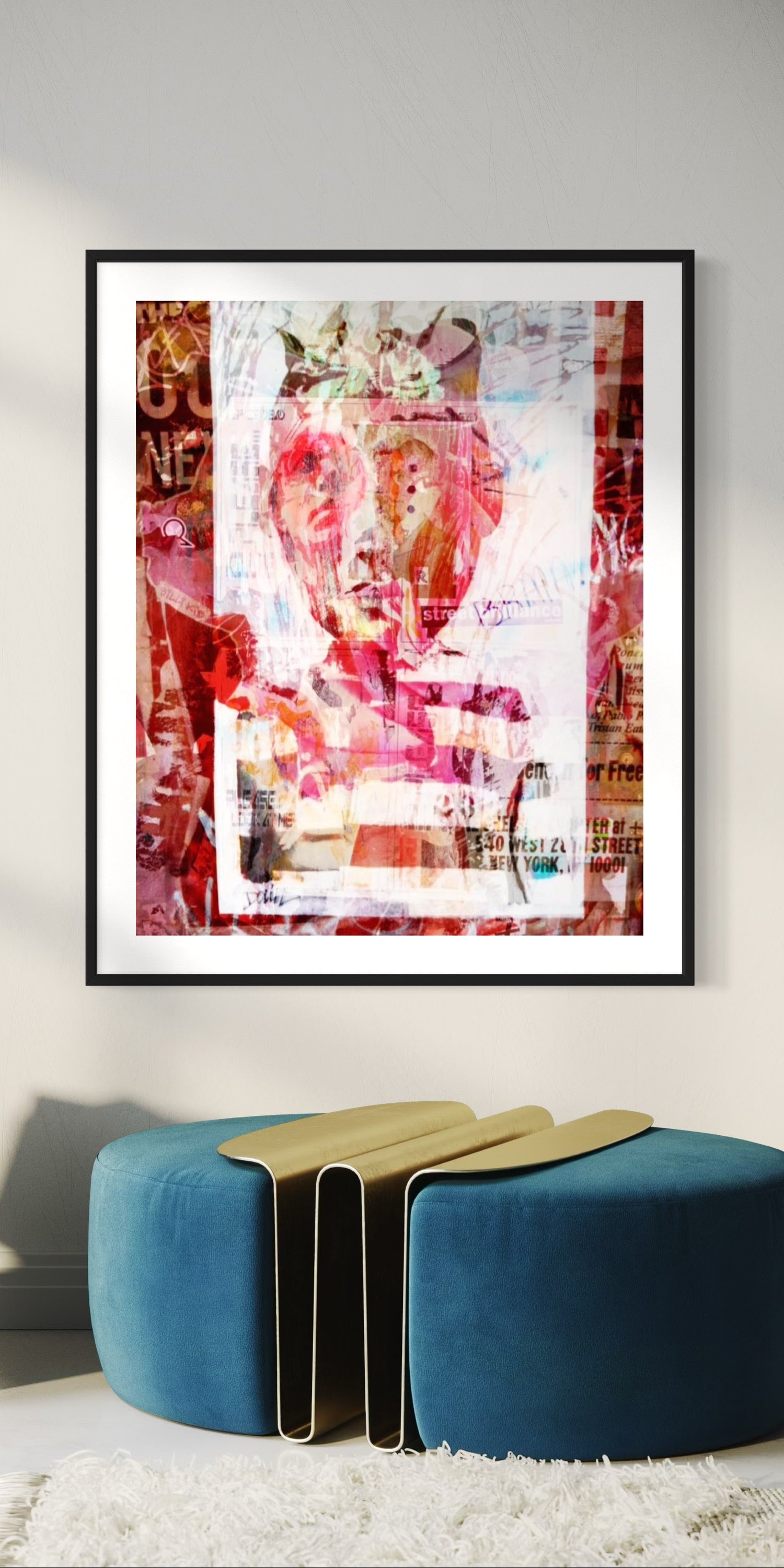 Framed abstract art piece on a wall with a blue and gold ottoman below.
